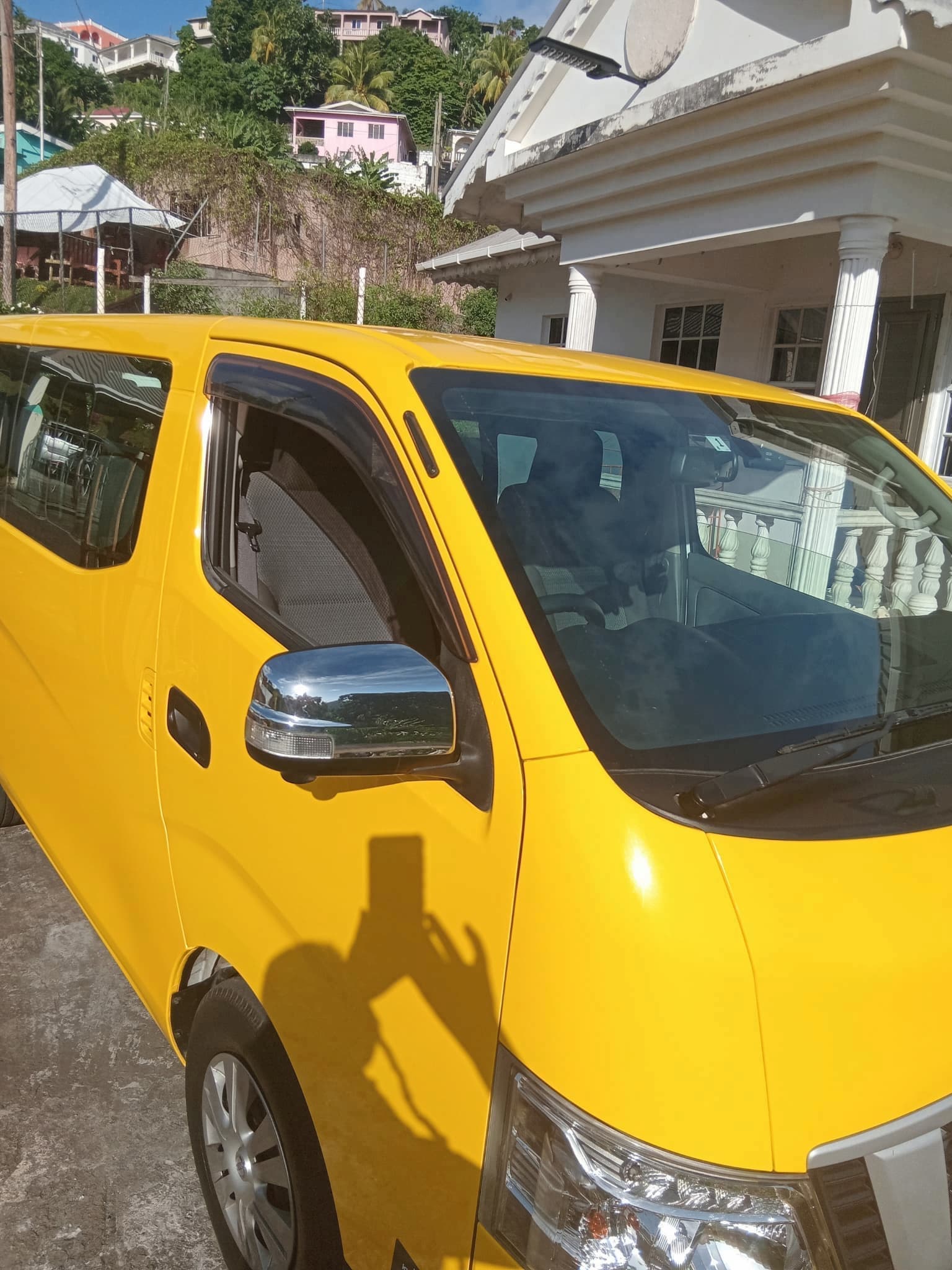 Ranchie Taxi - Nissan NV350 Side View